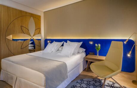 Cama de habitación en el hotel Barceló de Cáceres