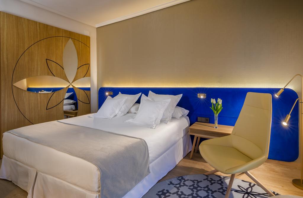 Cama de habitación en el hotel Barceló de Cáceres